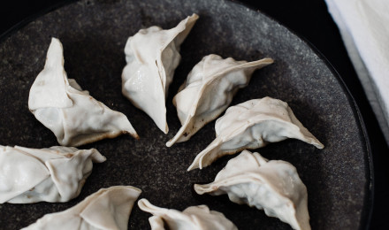 Plate with Japanese dumplings on table · Free