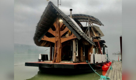 B.C. owner puts 'one of a kind, ' log float home up West Record