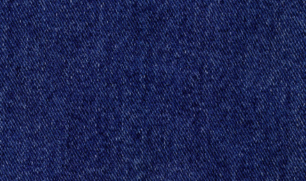 Blue denim square, background of textured jeans material