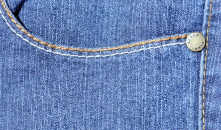 Another blue pocket of some jeans for a denim texture