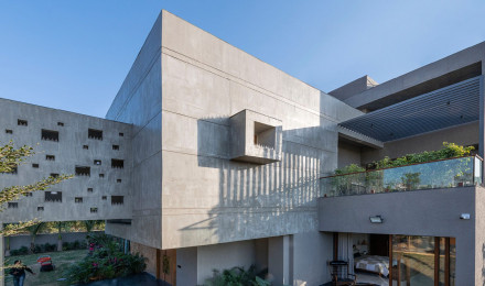 The Grid Architects erect sweeping concrete volumes with Pixel House in India