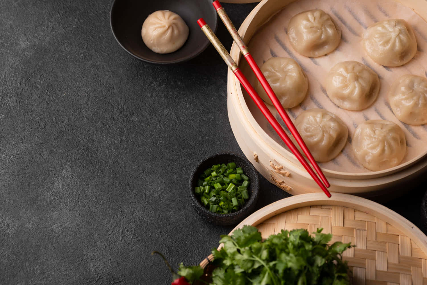 Download Dumplings, Chopsticks And Vegetables On A Dark Background