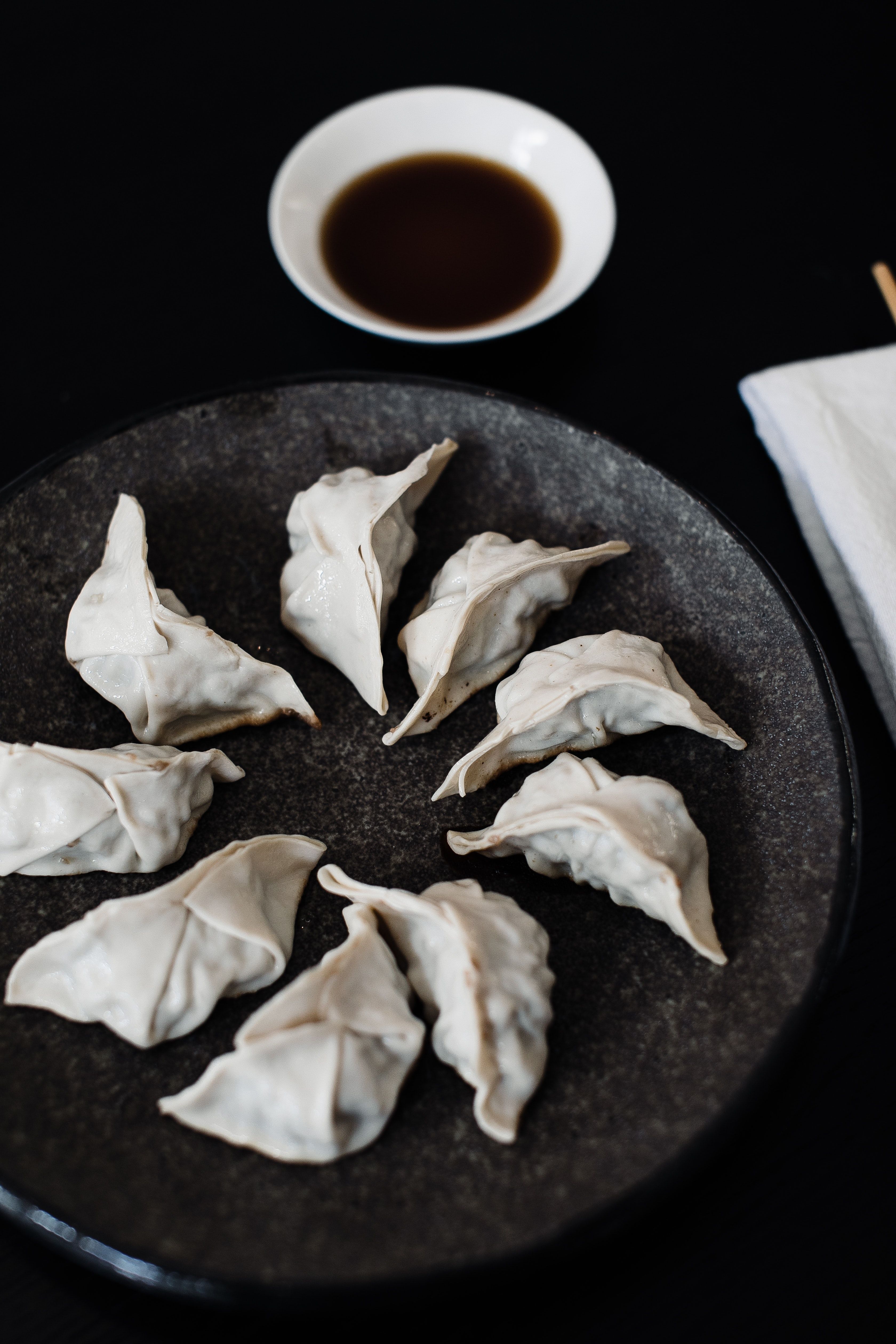 Plate with Japanese dumplings on table · Free