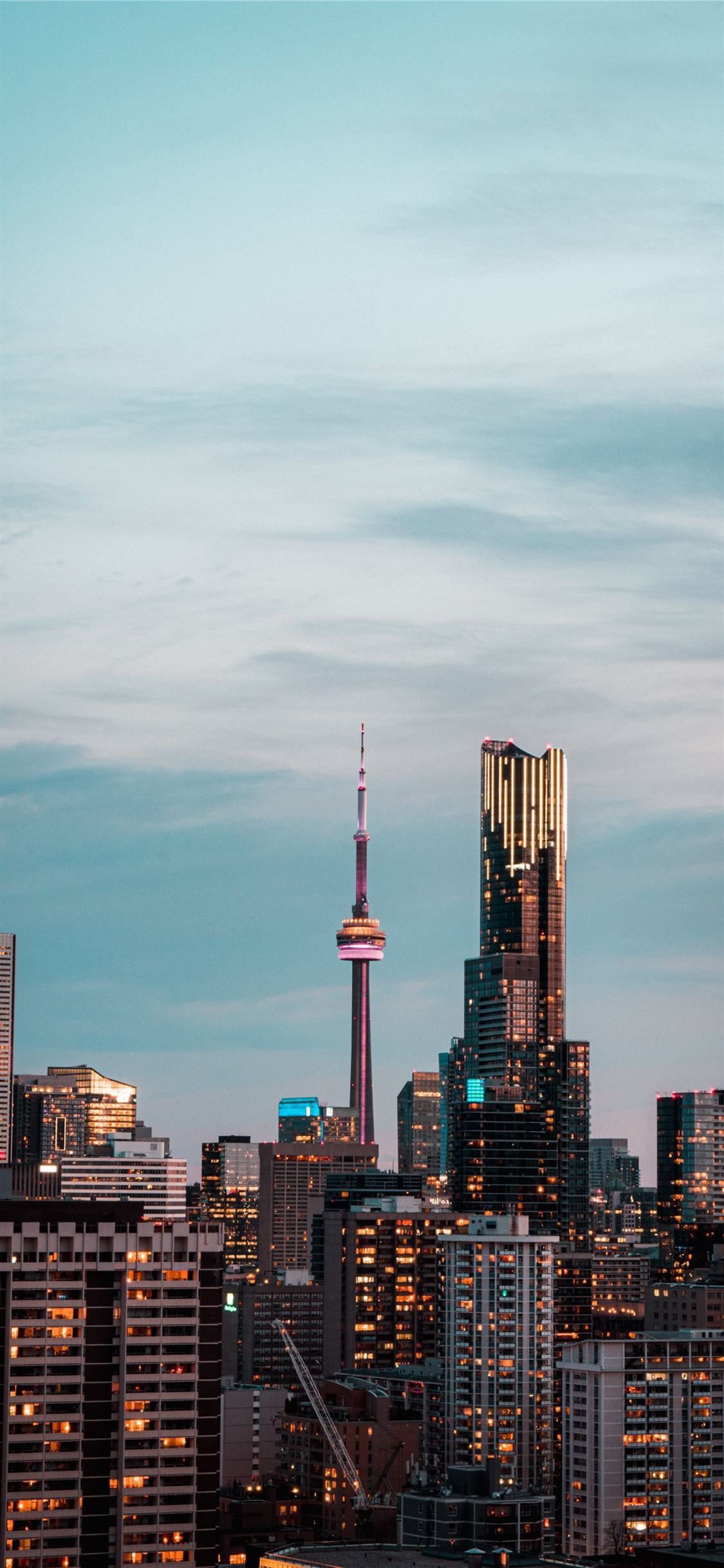 city skyline under gray cloudy sky during daytime #city #grey #sky #Toronto #on #Canada #iPhone11Wallpaper. Toronto city, Toronto skyline, Canada photography