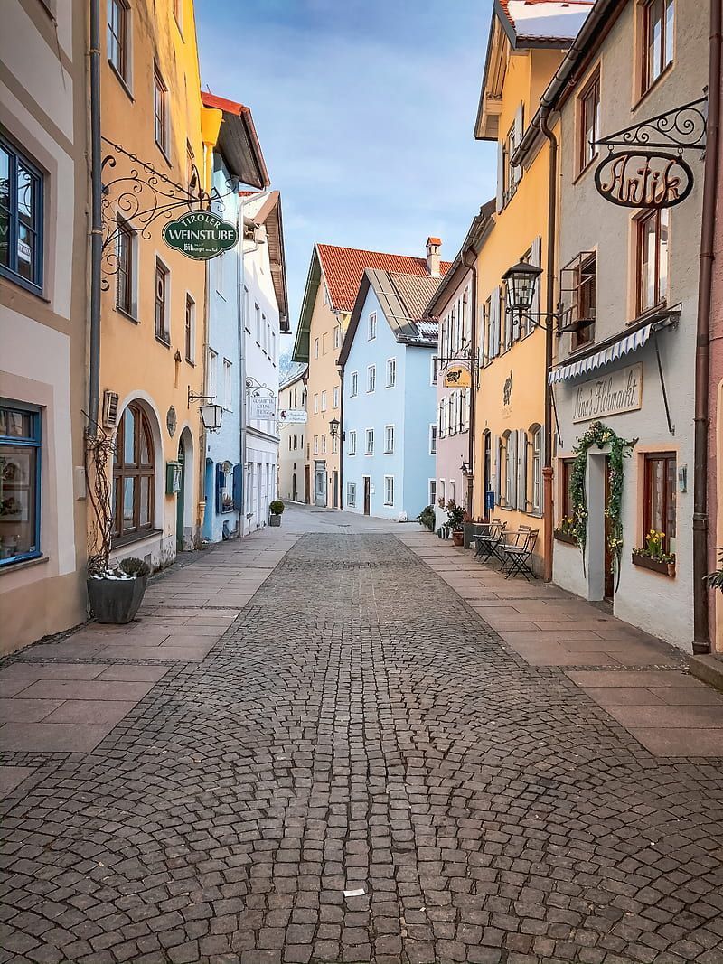 Empty street between concrete buildings during daytime, HD phone wallpaper