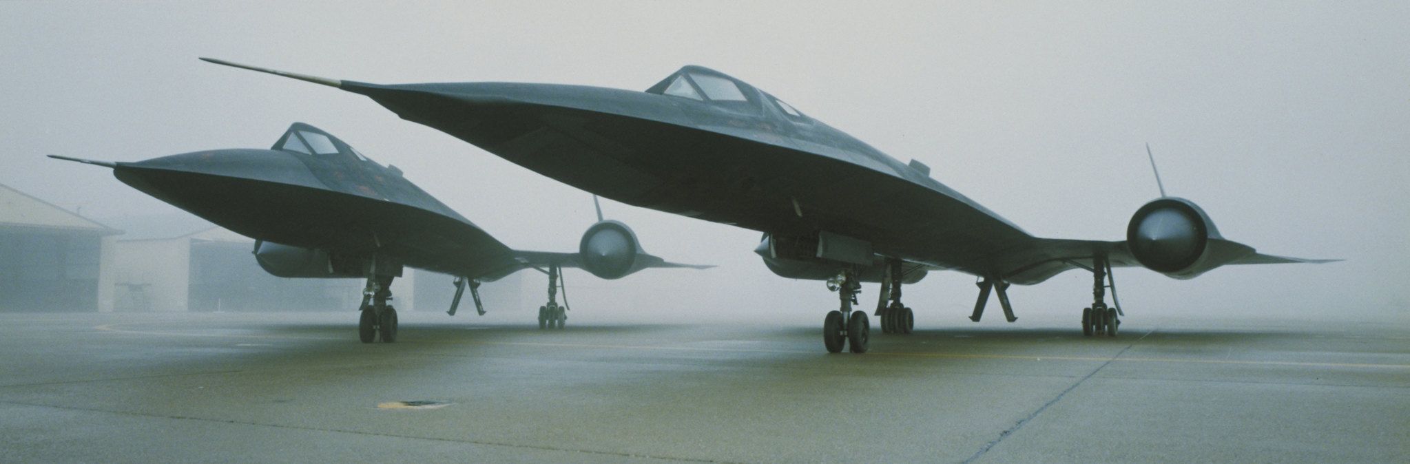 Blackbirds In Fog. Two Lockheed Martin SR 71 Blackbirds